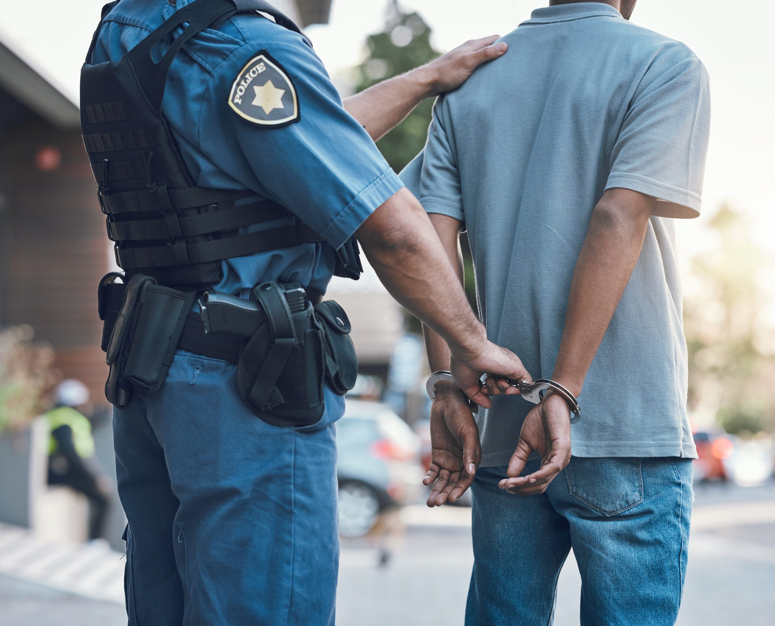 man being arrested for cargo theft